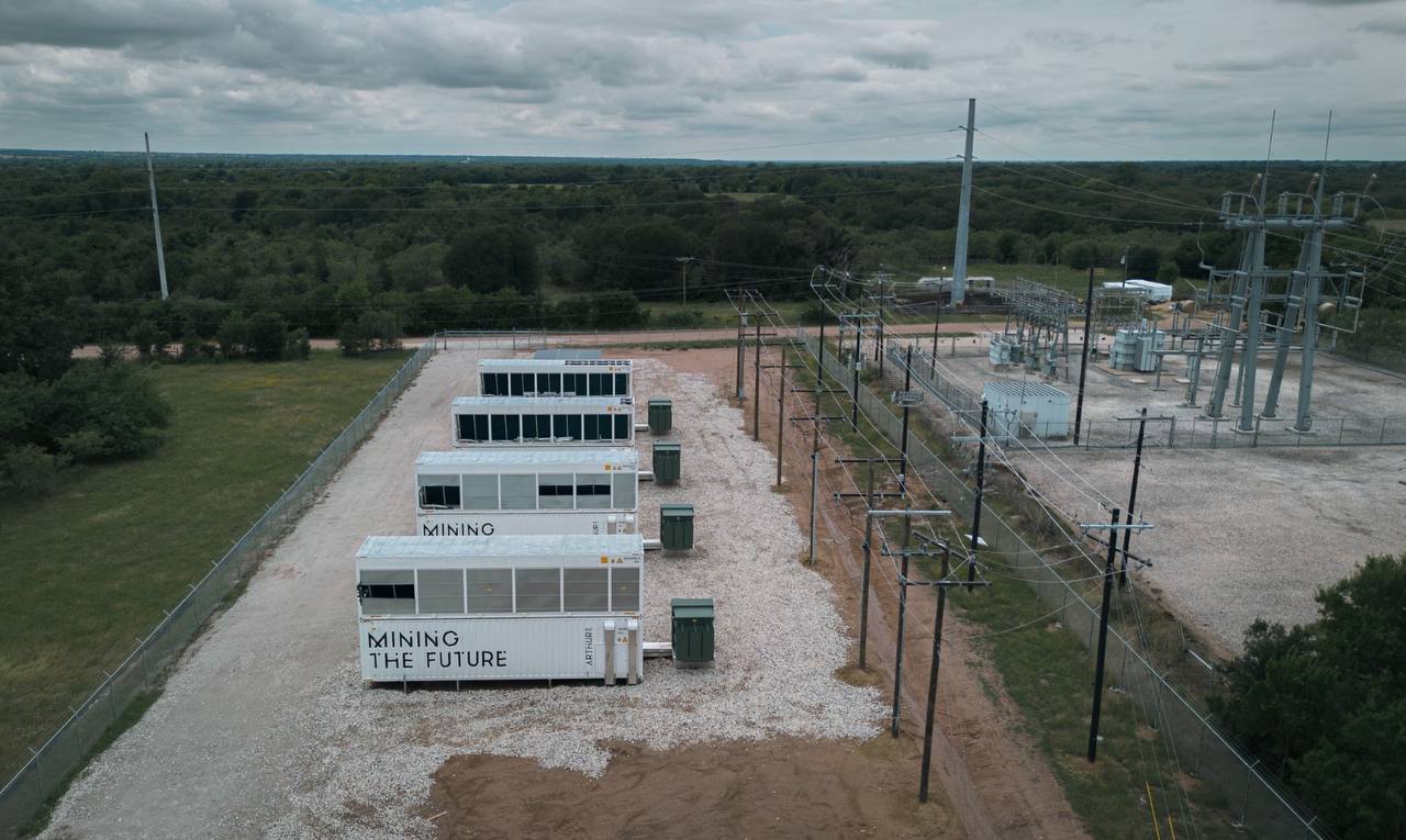Hydro mining containers beside power infrastructure