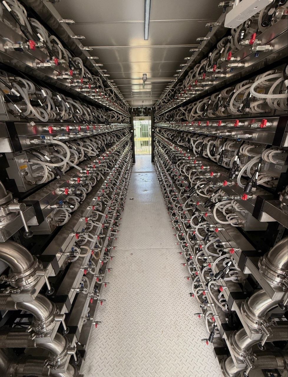 Hydro ASIC racks inside a container corridor